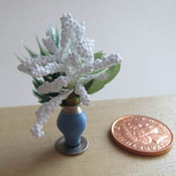 White Flowers in a Blue Vase